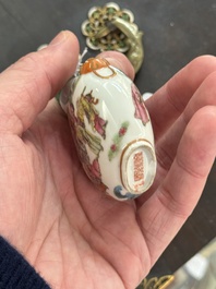 A Chinese famille rose '18 Luohan' snuff bottle, Daoguang mark and of the period