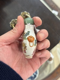 A Chinese famille rose '18 Luohan' snuff bottle, Daoguang mark and of the period