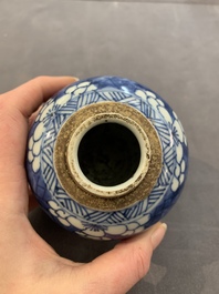 A Chinese wucai vase and seven blue and white jarlets, 19th C.