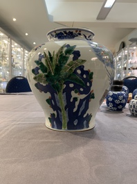 A Chinese wucai vase and seven blue and white jarlets, 19th C.