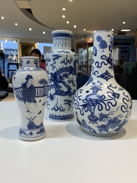 Three Chinese blue and white vases with antiquities, dragons and figures, 19th C.