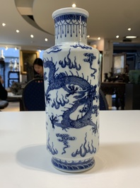 Three Chinese blue and white vases with antiquities, dragons and figures, 19th C.