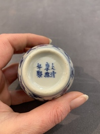 A Chinese wucai vase and seven blue and white jarlets, 19th C.