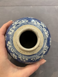 A Chinese wucai vase and seven blue and white jarlets, 19th C.