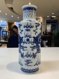 Three Chinese blue and white vases with antiquities, dragons and figures, 19th C.
