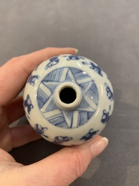 A Chinese wucai vase and seven blue and white jarlets, 19th C.