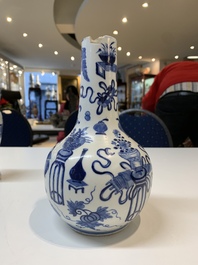 Three Chinese blue and white vases with antiquities, dragons and figures, 19th C.