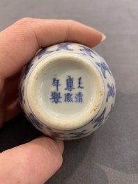 A Chinese wucai vase and seven blue and white jarlets, 19th C.