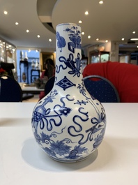 Three Chinese blue and white vases with antiquities, dragons and figures, 19th C.
