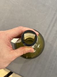 A rare Chinese translucent green Peking glass bottle vase, Qianlong mark and of the period