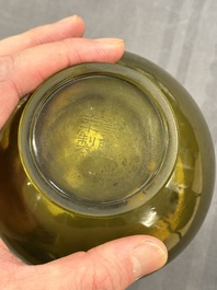 A rare Chinese translucent green Peking glass bottle vase, Qianlong mark and of the period