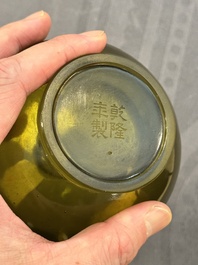 A rare Chinese translucent green Peking glass bottle vase, Qianlong mark and of the period