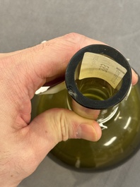 A rare Chinese translucent green Peking glass bottle vase, Qianlong mark and of the period