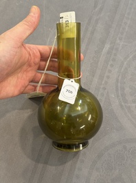 A rare Chinese translucent green Peking glass bottle vase, Qianlong mark and of the period