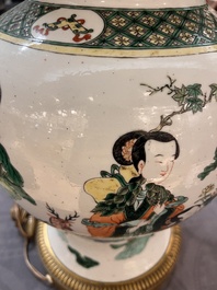 A Chinese famille verte vase and cover mounted as a lamp, 19th C.