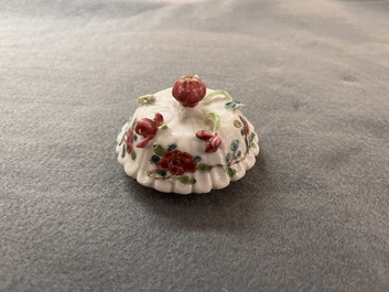 A Chinese famille rose 'rooster' teapot with applied floral design and a cup, Yongzheng/Qianlong