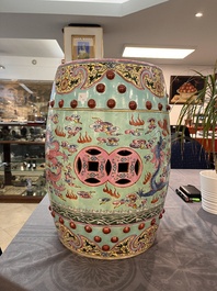 A pair of Chinese famille rose turquoise-ground 'dragon' garden seats, Republic