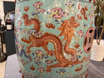 A pair of Chinese famille rose turquoise-ground 'dragon' garden seats, Republic