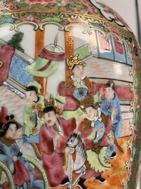 A pair of Chinese Canton famille rose vases and covers with narrative design, 19th C.