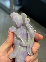 A Chinese lavender- and mint-green-jade figure of a goddess holding a sceptre and fan on wooden stand, 19th C.