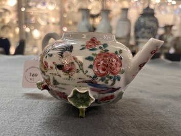 A Chinese famille rose 'rooster' teapot with applied floral design and a cup, Yongzheng/Qianlong