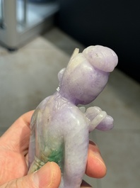 A Chinese lavender- and mint-green-jade figure of a goddess holding a sceptre and fan on wooden stand, 19th C.
