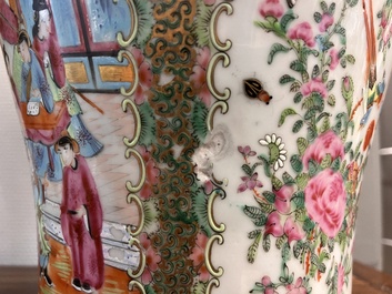 A pair of Chinese Canton famille rose vases and covers with narrative design, 19th C.