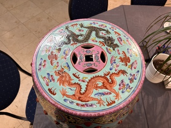 A pair of Chinese famille rose turquoise-ground 'dragon' garden seats, Republic