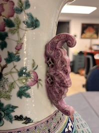 A Chinese famille rose 'magpies and plum blossoms' vase on wooden stand, 19th C.