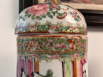 A pair of Chinese Canton famille rose vases and covers with narrative design, 19th C.