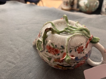 A Chinese famille rose 'rooster' teapot with applied floral design and a cup, Yongzheng/Qianlong