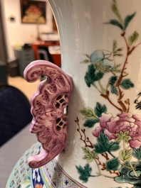A Chinese famille rose 'magpies and plum blossoms' vase on wooden stand, 19th C.