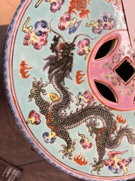 A pair of Chinese famille rose turquoise-ground 'dragon' garden seats, Republic