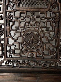 Four Chinese carved and openworked wooden doors, early 20th C.