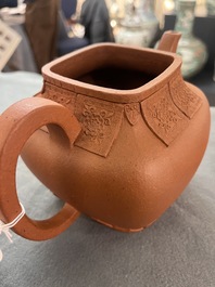 Two Chinese Yixing stoneware teapots, seal marks, 19th C.