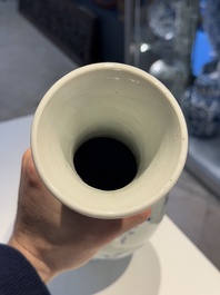 A Chinese blue and white pear-shaped vase with floral design, Transitional period