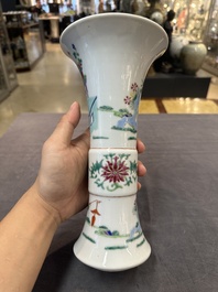 A pair of Chinese famille rose wall vases and a 'gu' vase, 19/20th C.