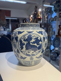 A large Chinese blue and white 'mythical creatures' jar, 'guan', Jiajing/Wanli