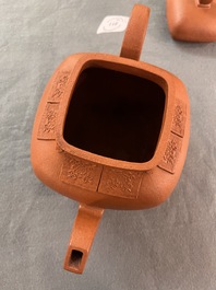 Two Chinese Yixing stoneware teapots, seal marks, 19th C.