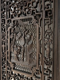 Four Chinese carved and openworked wooden doors, early 20th C.