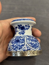 A Chinese blue and white goblet, a salt and a vase, Kangxi