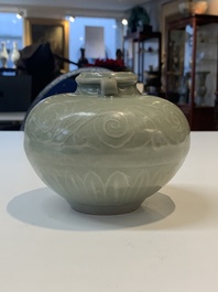 Two Chinese Longquan celadon jars with floral design, Ming