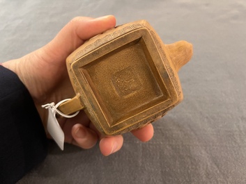 Two Chinese Yixing stoneware teapots, seal marks, 19th C.