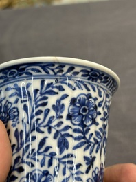 A Chinese blue and white goblet, a salt and a vase, Kangxi