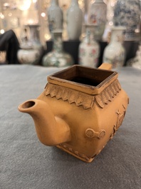 Two Chinese Yixing stoneware teapots, seal marks, 19th C.