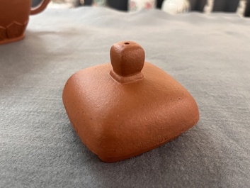 Two Chinese Yixing stoneware teapots, seal marks, 19th C.