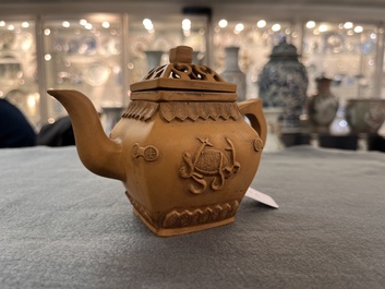 Two Chinese Yixing stoneware teapots, seal marks, 19th C.