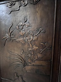 Four Chinese carved and openworked wooden doors, early 20th C.