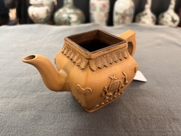 Two Chinese Yixing stoneware teapots, seal marks, 19th C.