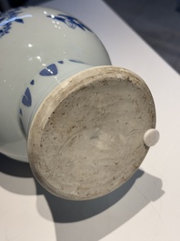 A Chinese blue and white pear-shaped vase with floral design, Transitional period